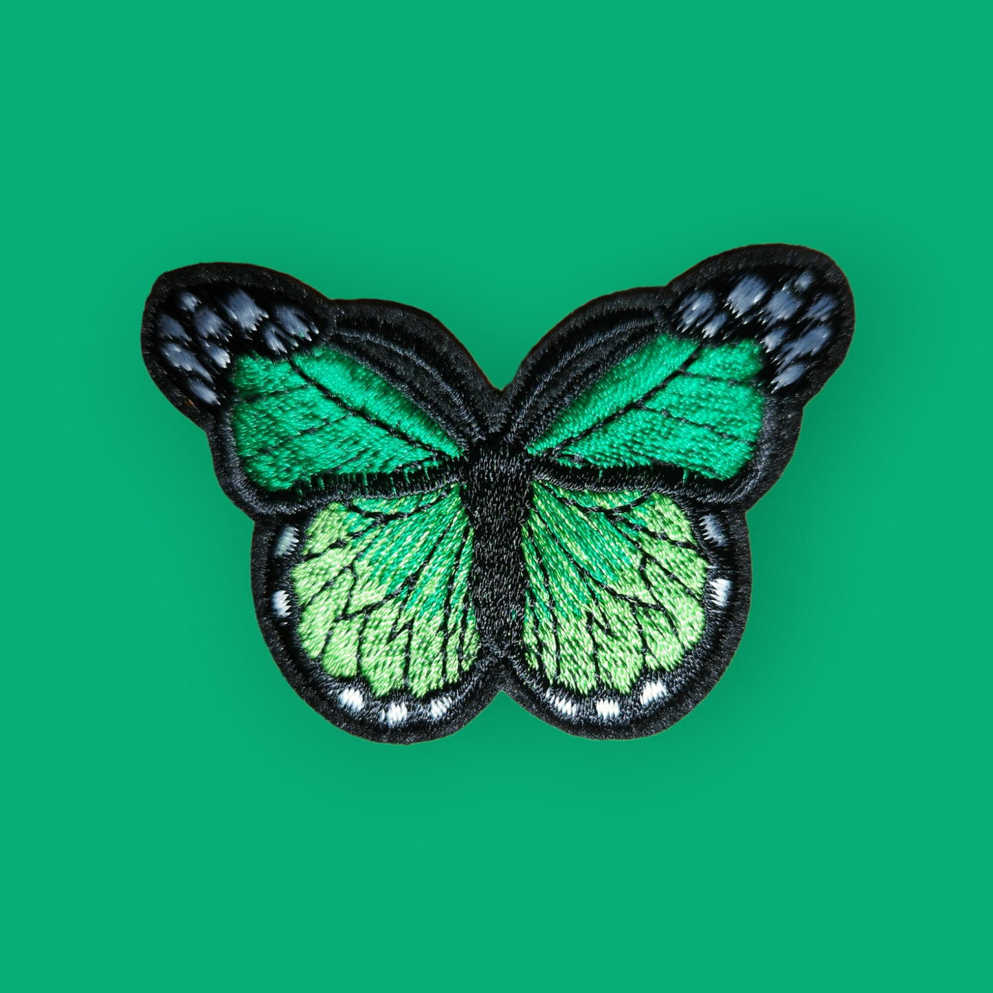 Bügelpatch Schmetterling grün 7x5cm