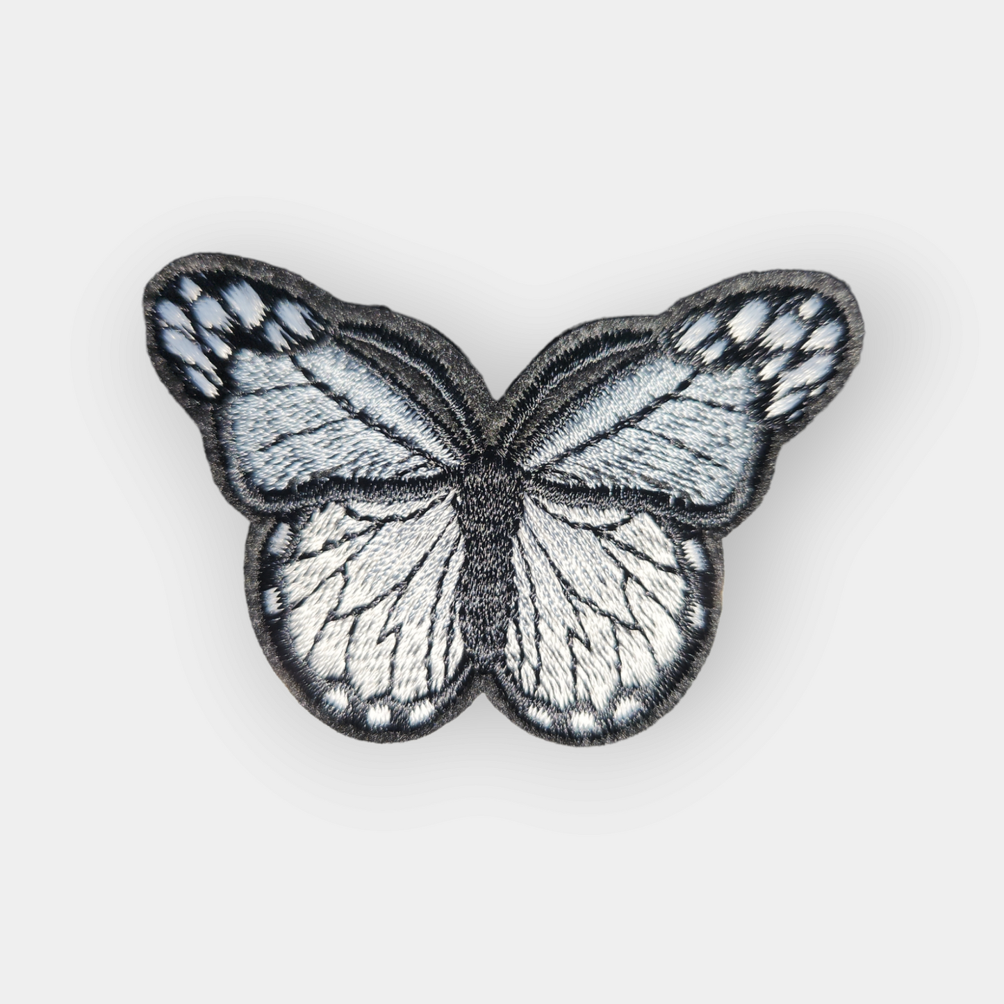 Bügelpatch Schmetterling grau 7x5cm